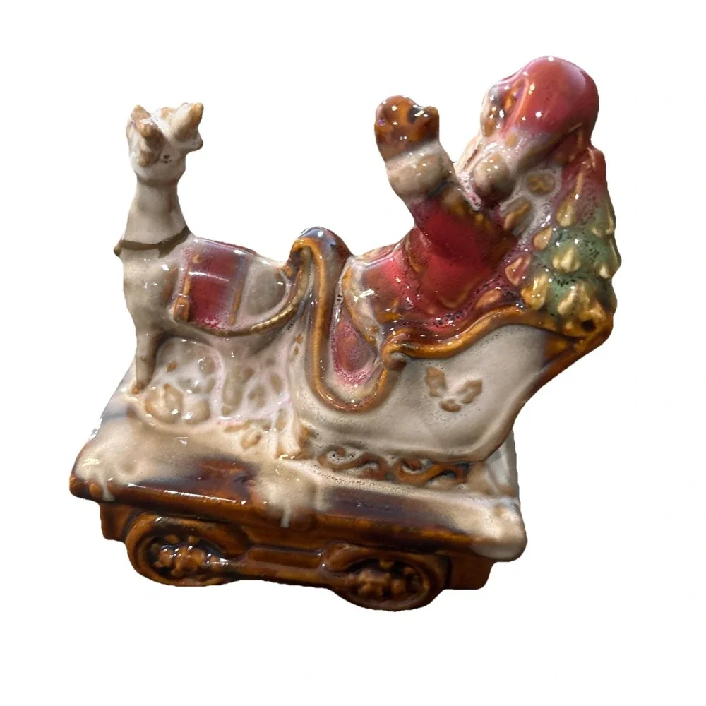 Beautifully Painted Ceramic Santa Claus with Reindeer on a Train Car